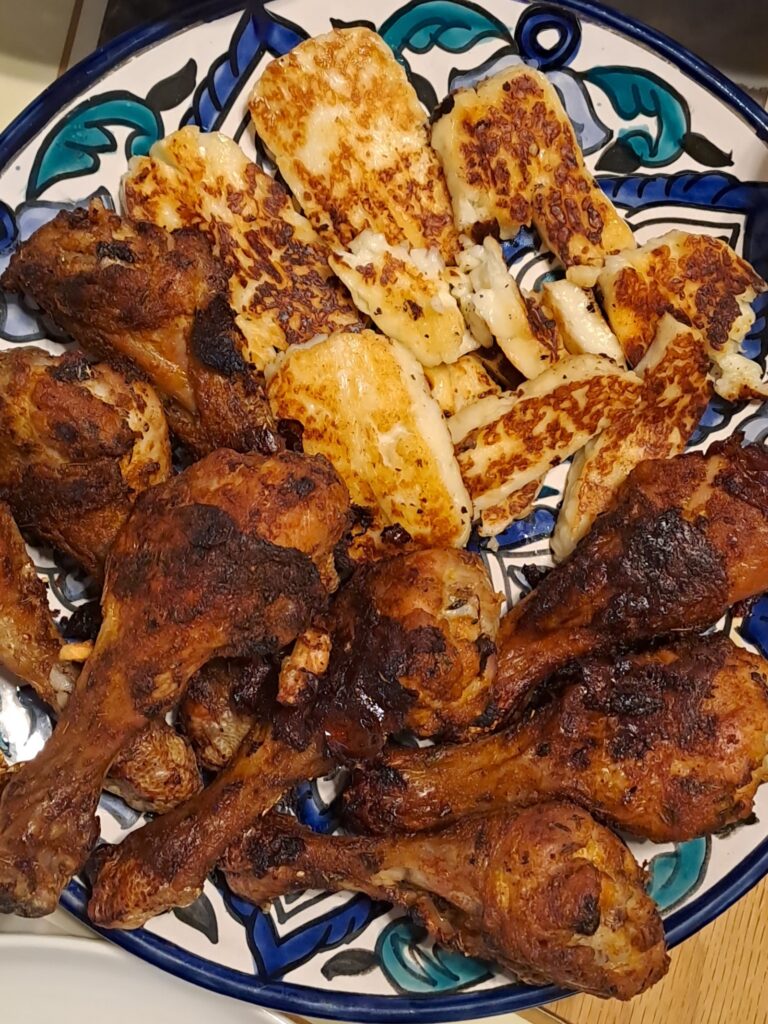 dry spiced chicken drumsticks with grilled halloumi